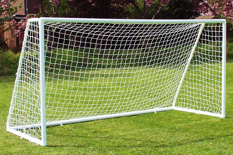 Professional football goal installation with durable netting by NK Contractors